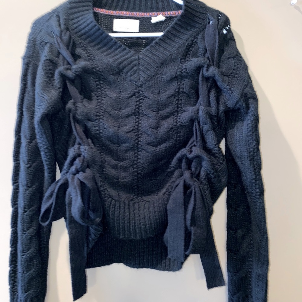 Black sweater with bows